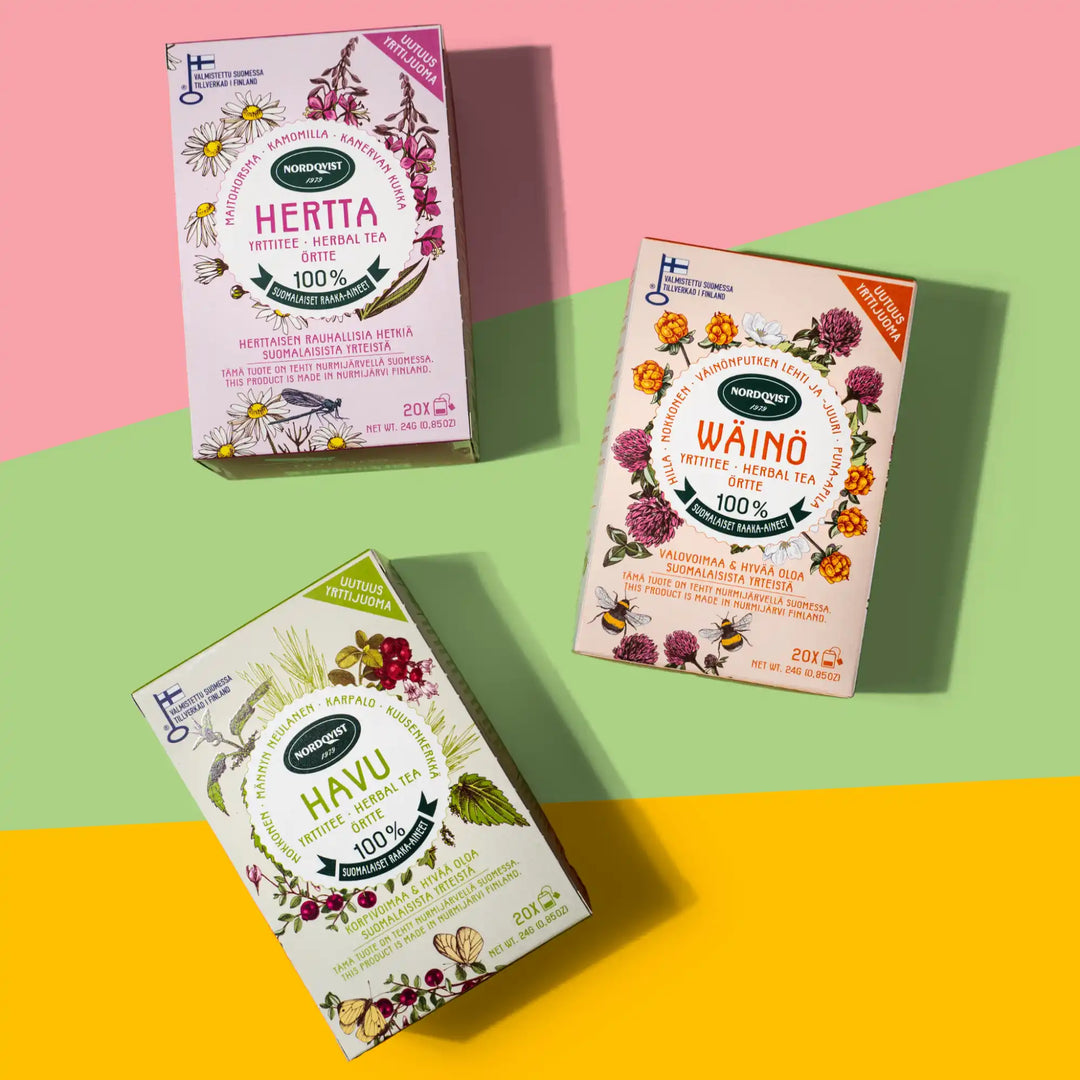 Herbal tea box set featuring hertta, havu and waino flavors in vibrant colors with floral illustrations.